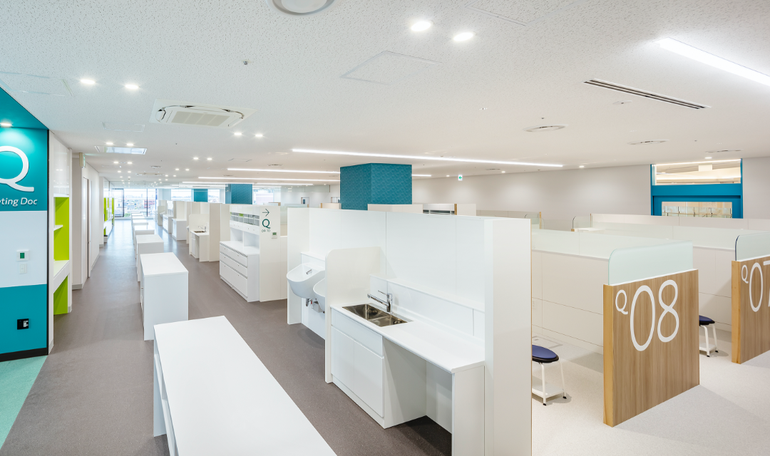 Workstations and student training space is located along the connecting corridors used by staff.