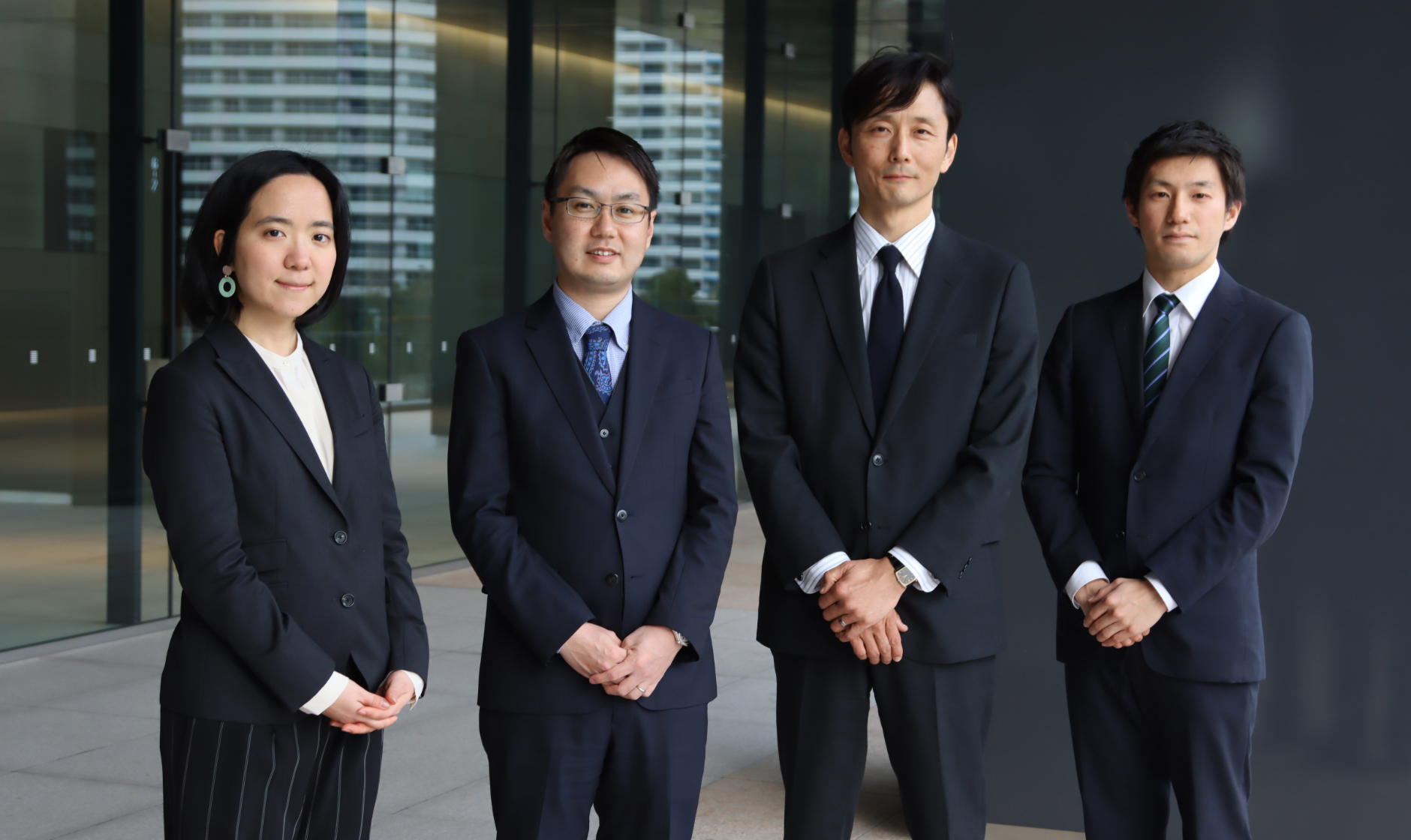 People in charge of Yokohama GRANGATE in Project Promotion Dept. II, Investment and Development Div. From left, Yuri Tanaka, Makoto Saito, Project Manager Takuya Kumazawa, and Yushi Yamamoto
