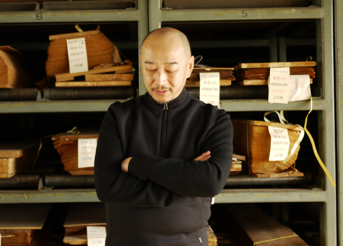Mr. Shimura photographed at Shimizu’s Tokyo Mokkoujou Arts & Crafts Furnishings. The very sight of untreated lumber, he says, inspires the urge to create.