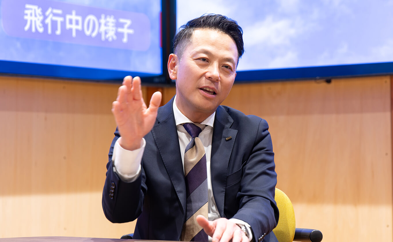 KDDI岡本氏