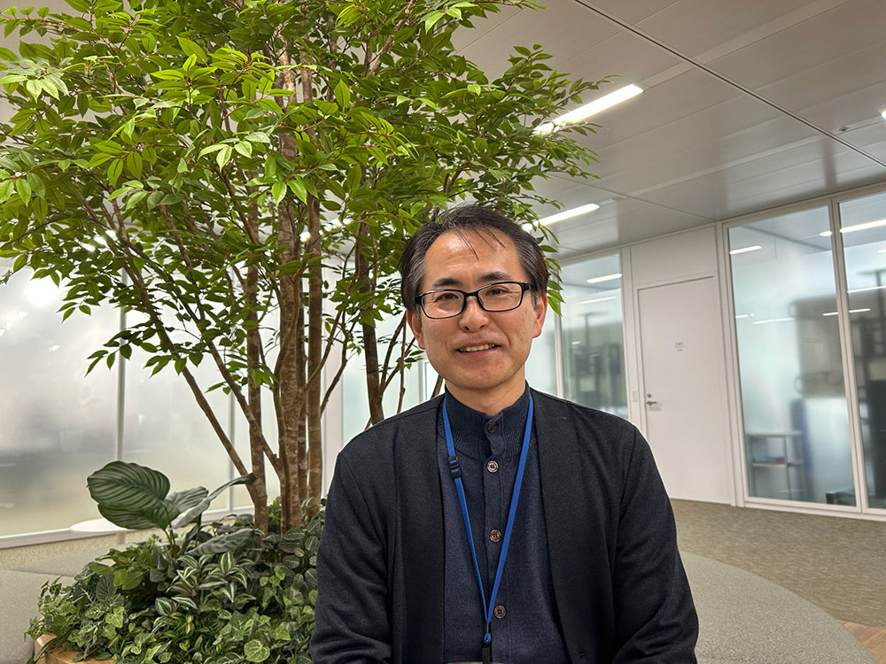 共同事業の成果を語る佐怒賀