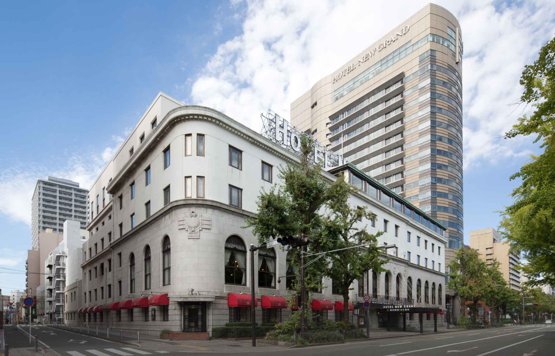 Hotel New Grand. The main building in the foreground was built in 1927, and the tower annex in the rear was built in 1991.